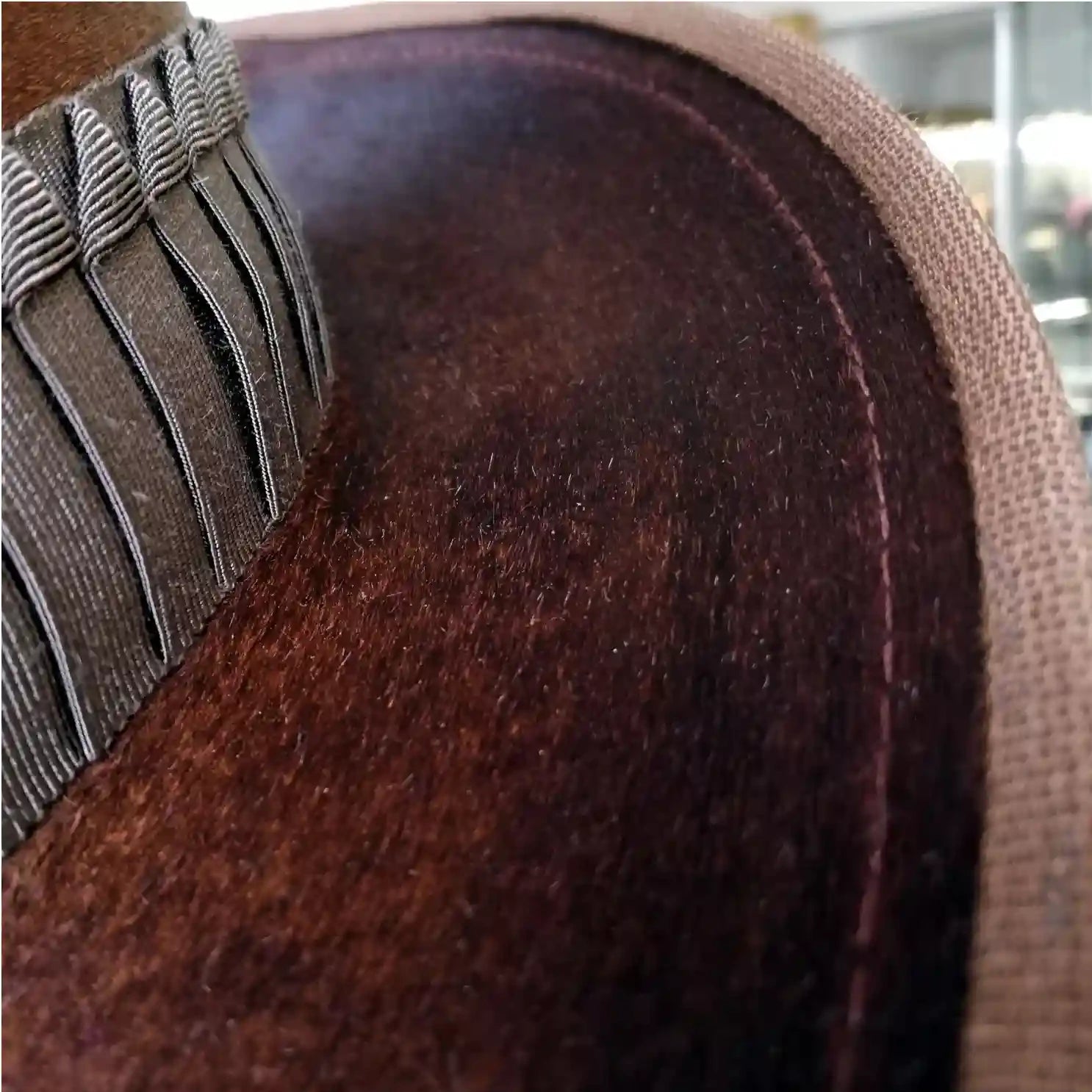 Close-up shot showcasing the detailed finishing of a custom Agnoulita Hat designed by a customer.