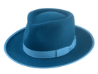 Equinox dark teal fedora with an exclusive teardrop crown design, accentuated by a sky-colored band